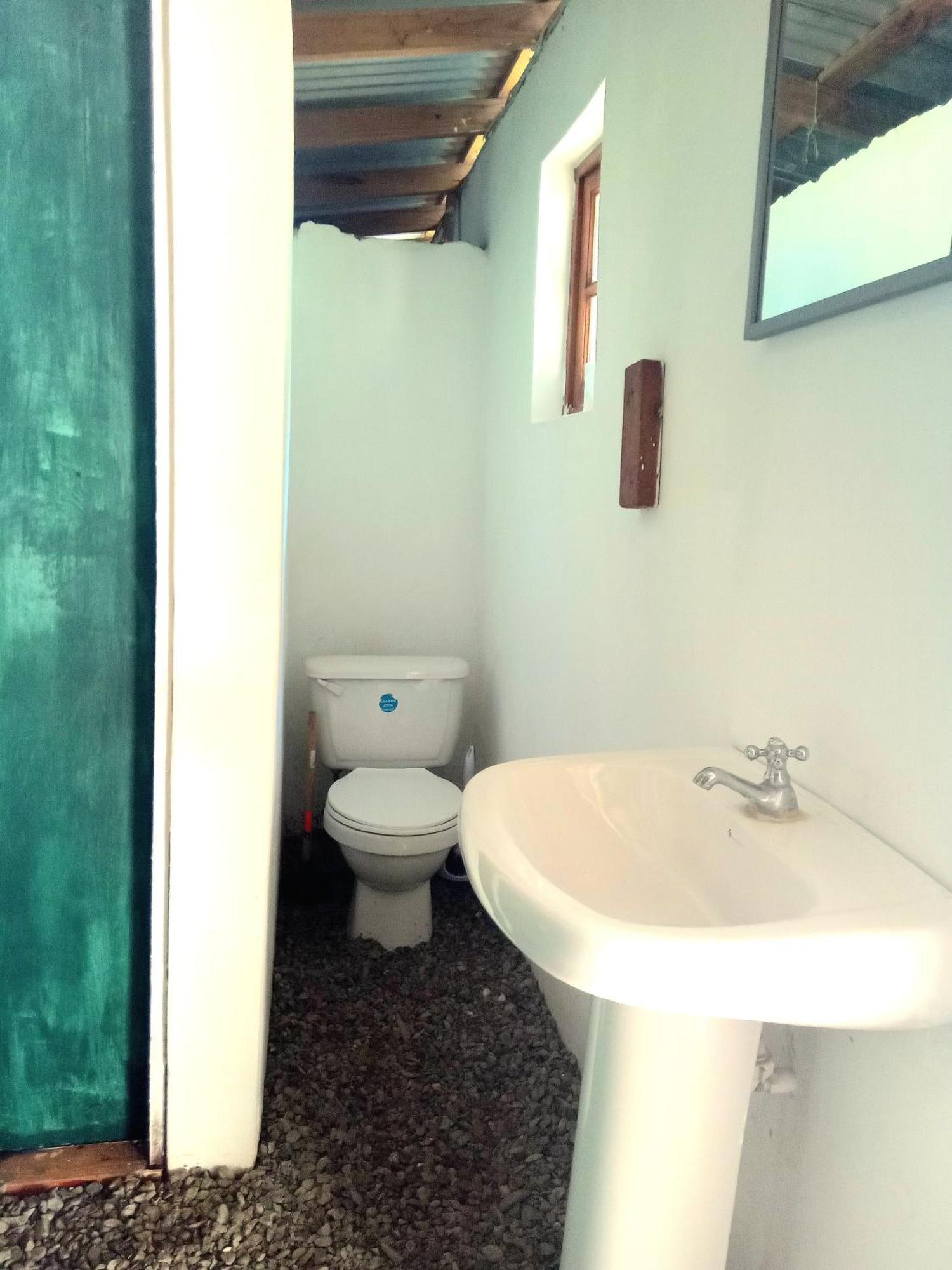 פורט אנטוניו La Familia Guest House And Natural Farm מראה חיצוני תמונה